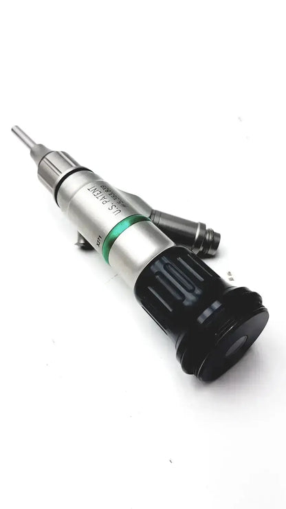 Silver and black precision screwdriver with green band and textured grip sections for jedmed starmed video otoscope
