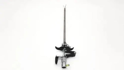 Black and silver karl storz 27094p optical kidney stone grasper with long metallic shaft and adjustable clamps