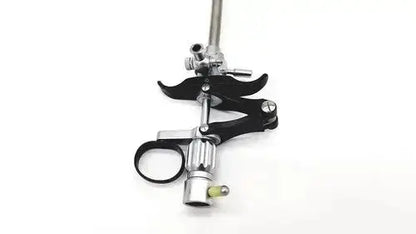 Black and silver karl storz 27094p optical kidney stone grasper with curved handle and adjustable grip mechanism