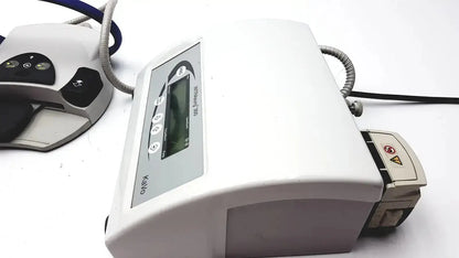 White kavo intrasurg 300 dental implant drill with digital display, control panel, plastic casing, and connected cables
