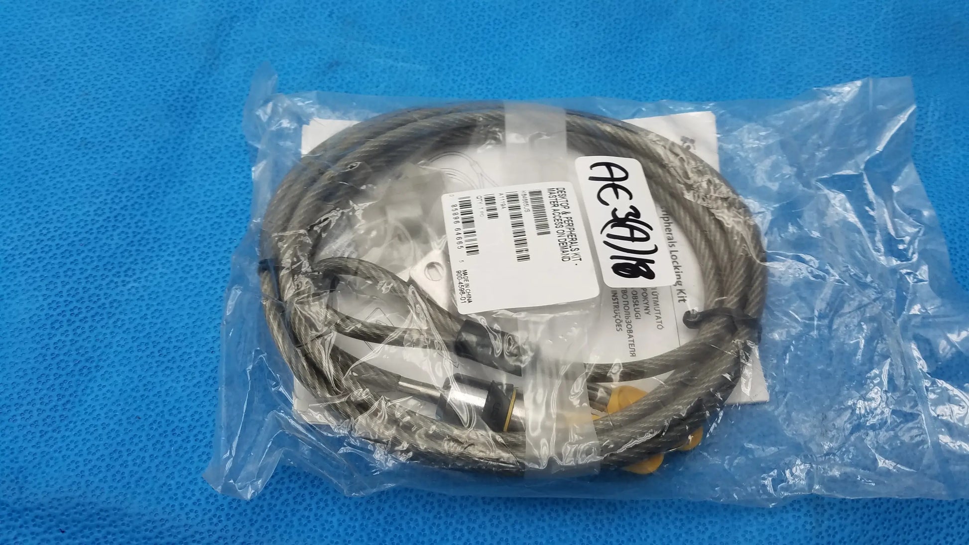 Kensington k64665us desktop locking kit with coiled gray steel cable and black yellow connectors for buy used medical equipment