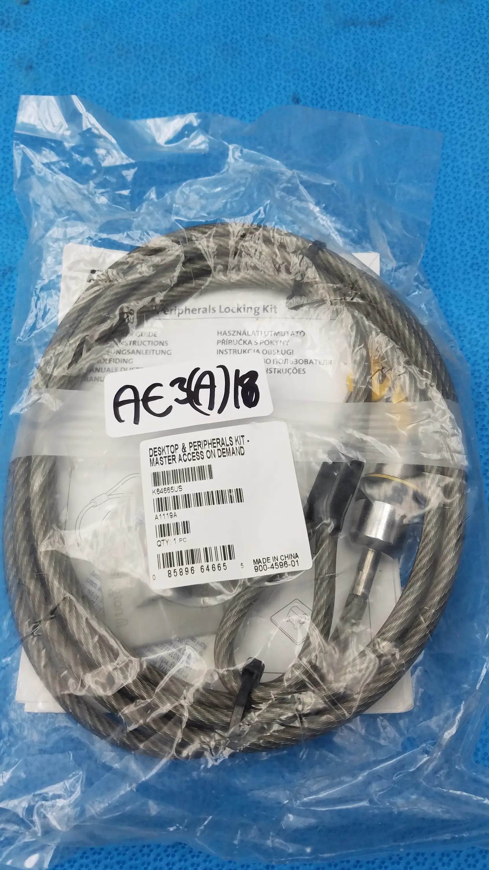 Gray steel cable with metallic connectors in clear plastic packaging from kensington k64665us locking kit for pre owned medical equipment