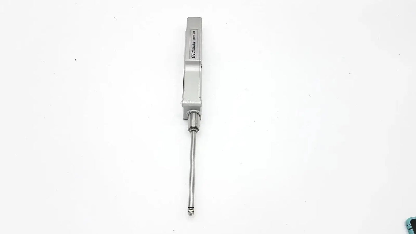 Silver-colored keyence gt2-h50 intelligent series contact sensor with rectangular housing and extended metallic rod