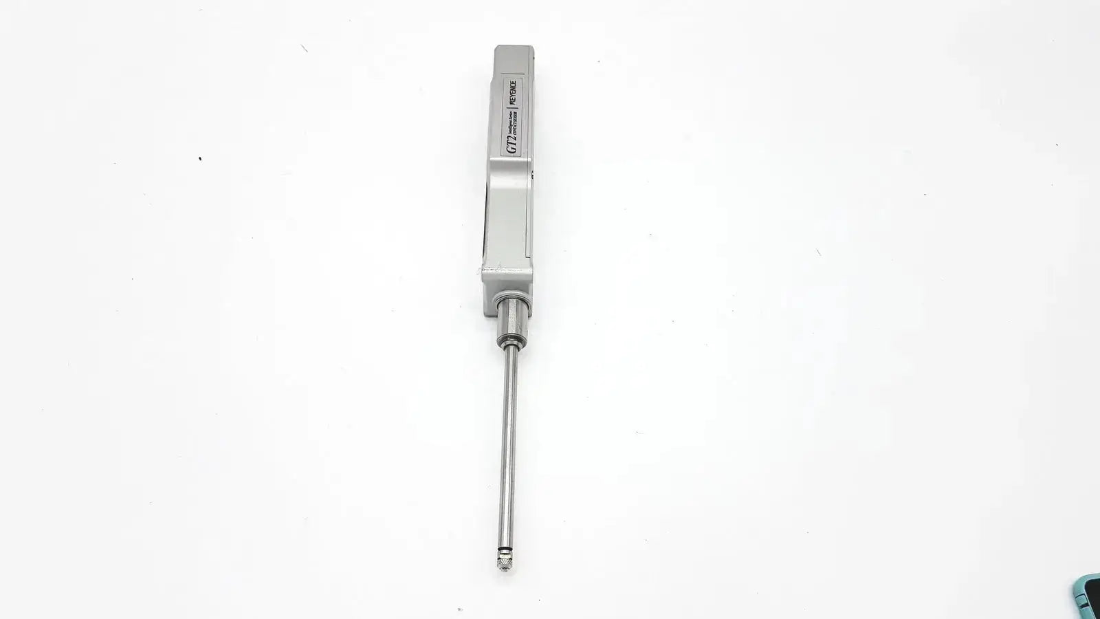 Silver-colored keyence gt2-h50 intelligent series contact sensor with rectangular housing and extended metallic rod