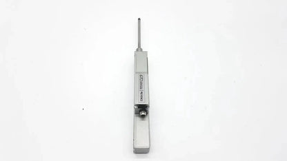 Silver metallic door closer with cylindrical rod and engraved labeling from keyence gt2-h50 intelligent series contact sensor