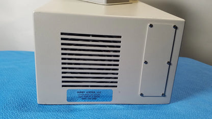 Beige rectangular kirby lester kl15e pharmacy tablet and capsule counter with vented side panel and blue brand label