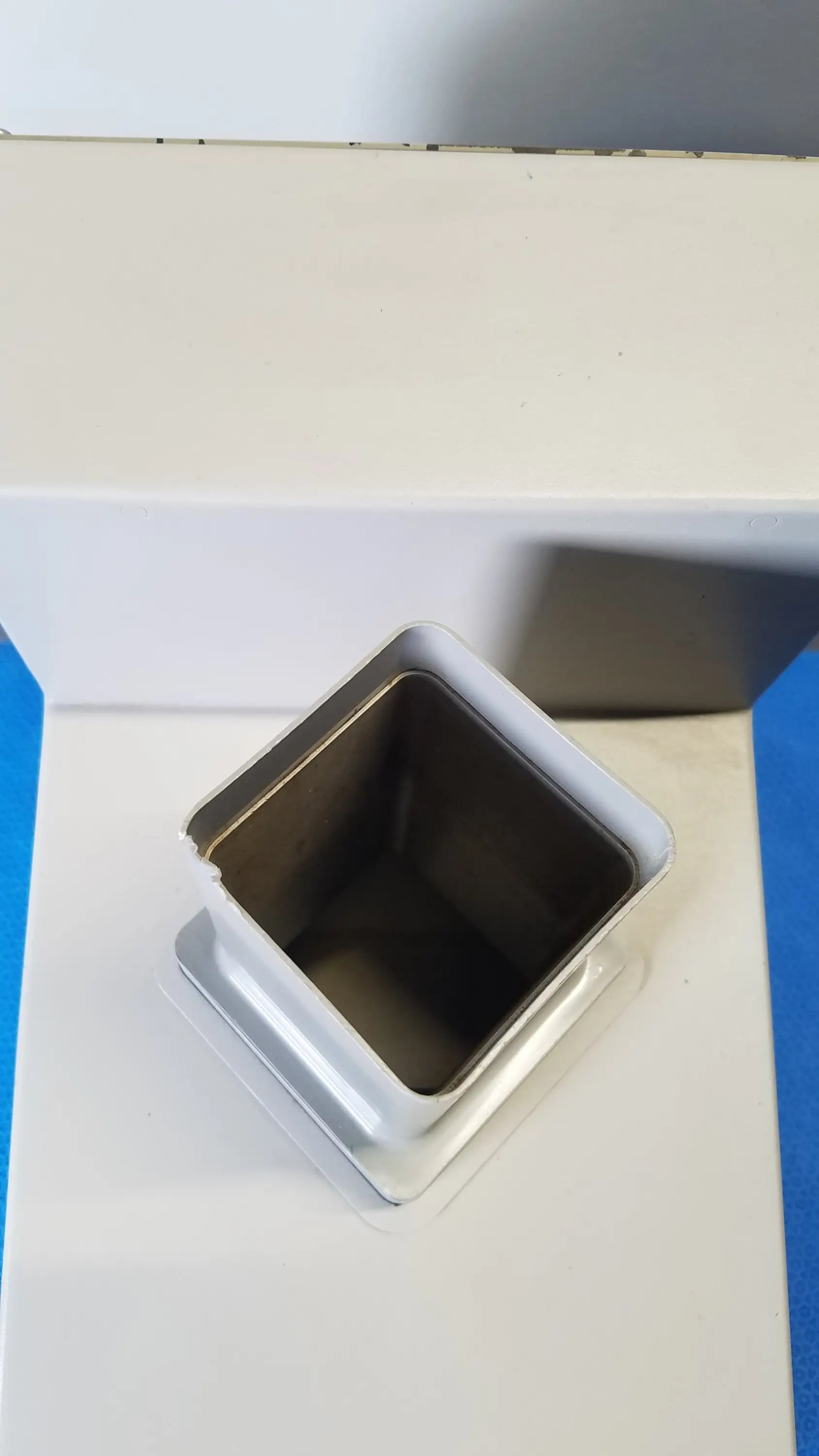 Silver square metal pen holder with raised rim and reflective interior for kirby lester kl15e pharmacy equipment