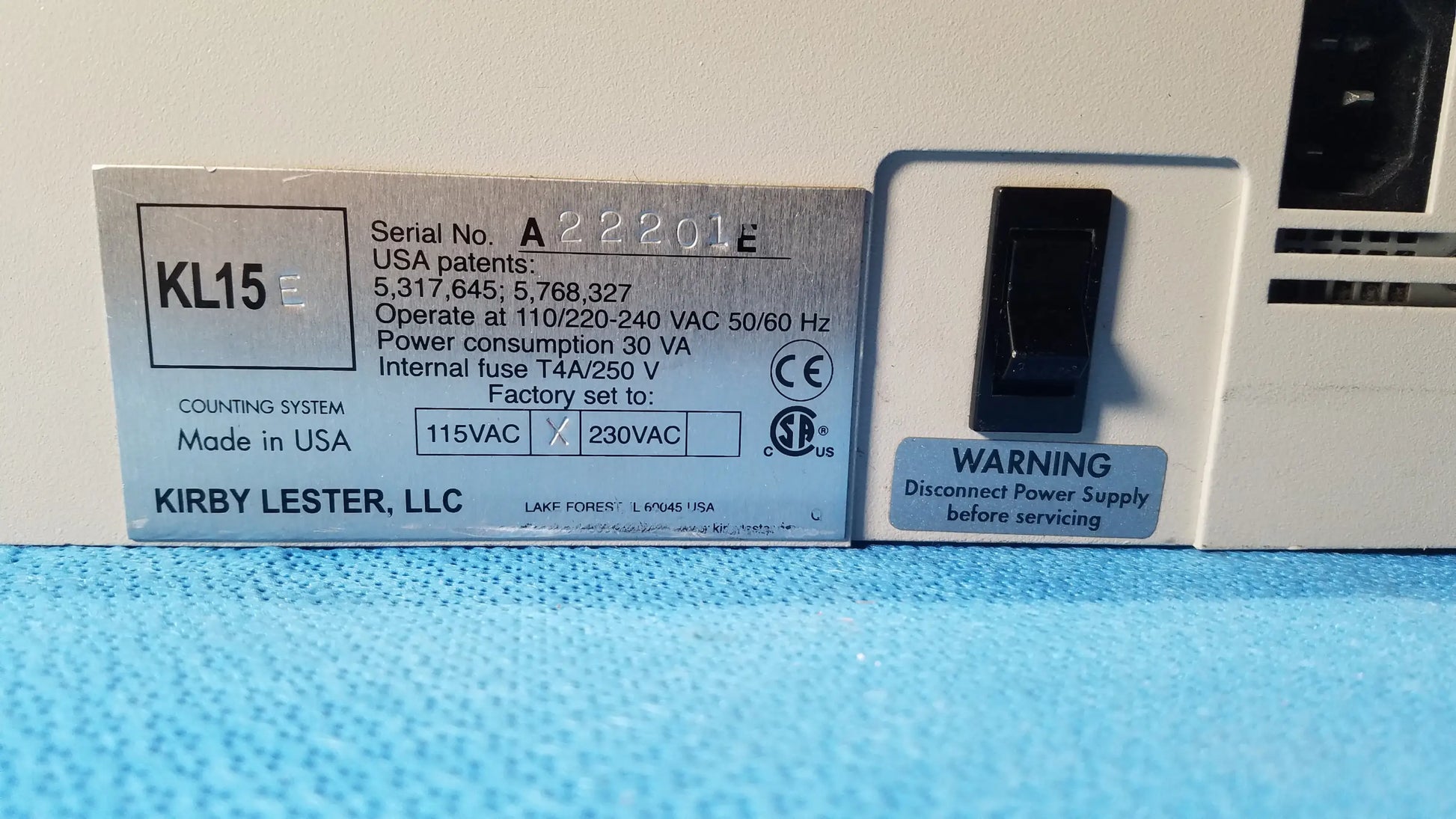 White plastic power supply unit with silver kl15e label and black switch for kirby lester kl15e medical equipment