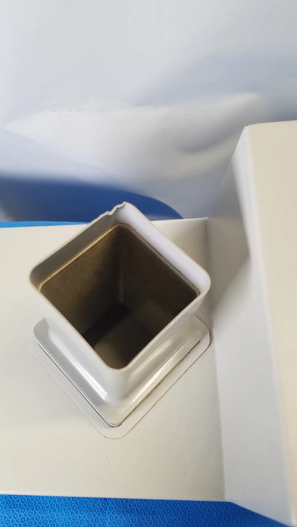 White square-shaped plastic container with raised rim and open top for kirby lester kl15e pharmacy tablet counter medical equipment
