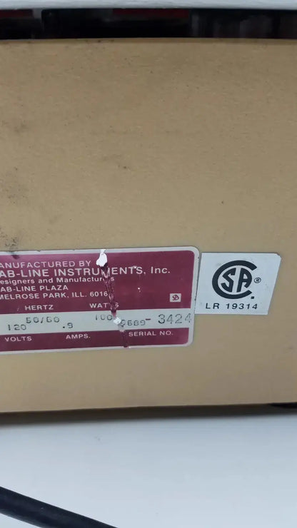 Brown cardboard box with red label and white certification sticker for lab-line orbit mixer shaker model 3520