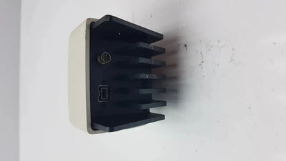 Black and beige plastic heat sink with circular connector and usb interface on the back of leica dfc450 5mp microscope camera