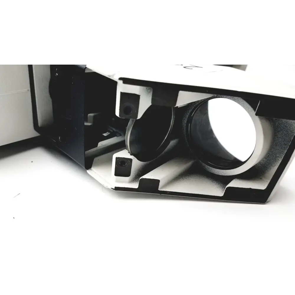 Black and white plastic vr headset with circular lenses and internal camera components.