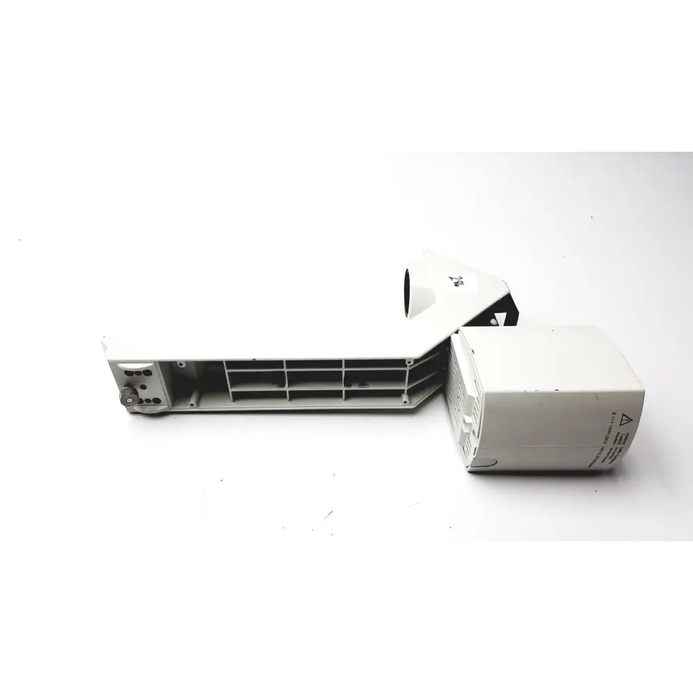 White plastic electronic component with internal grid structure and labeled side panel