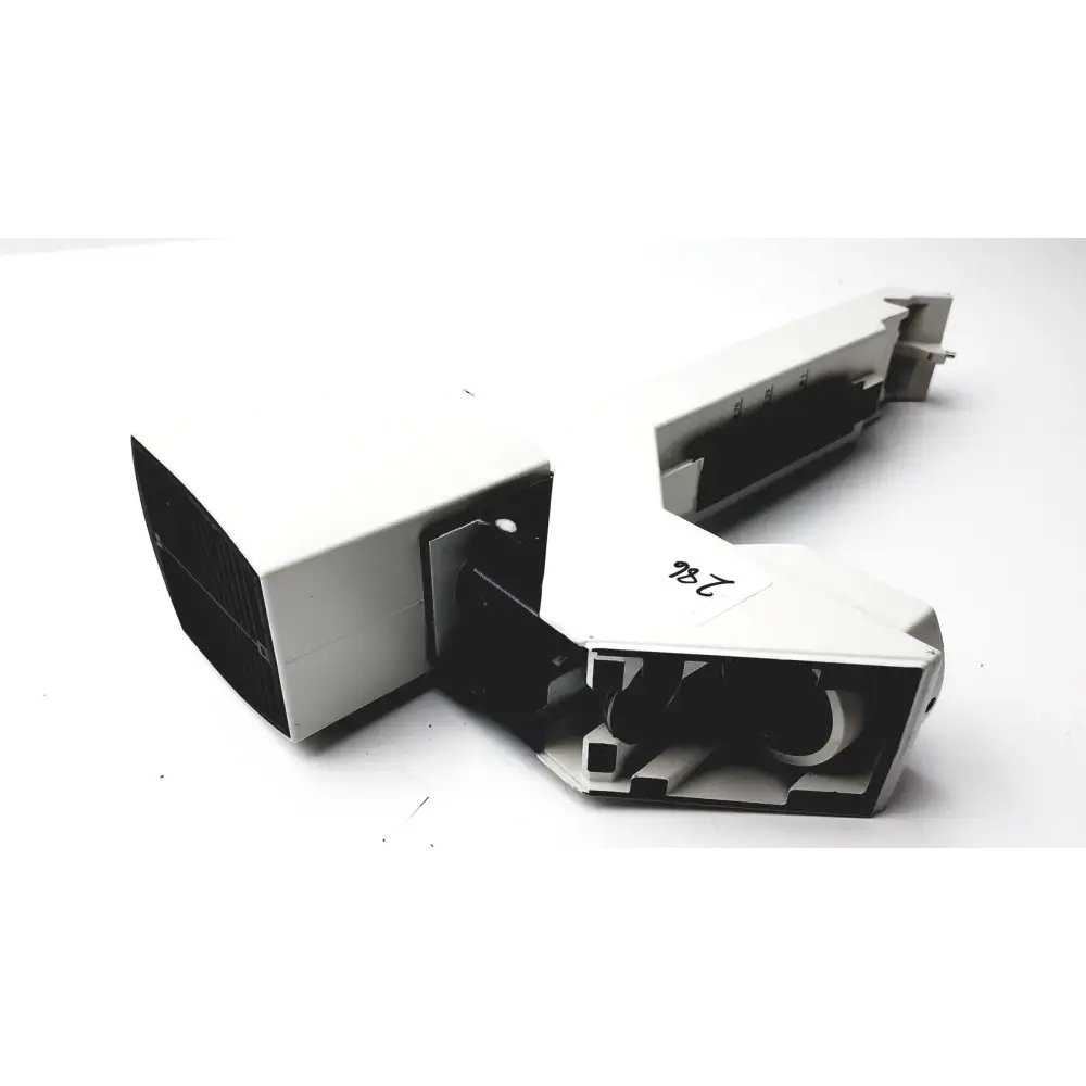 White plastic camera housing with black internal components and a visible label marked ’246’’