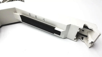 White metal lathe tool holder with black insert and engraved measurements for Leica DM IRB 12v 100w halogen lamp housing