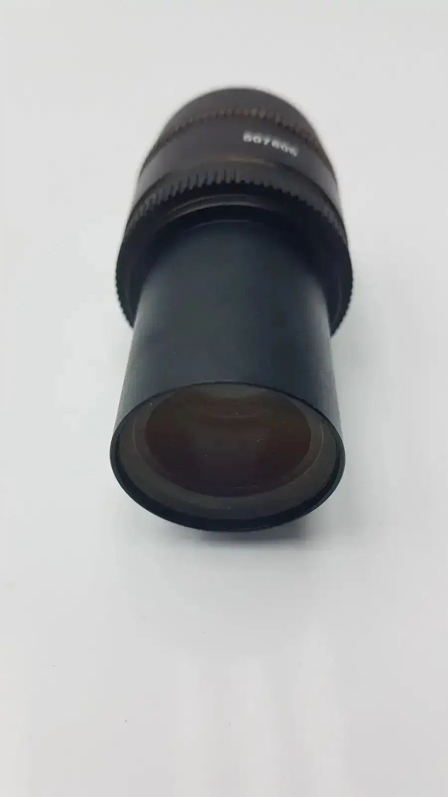 Black cylindrical leica hc plan microscope eyepiece with textured focus ring and engraved markings from hospital surplus