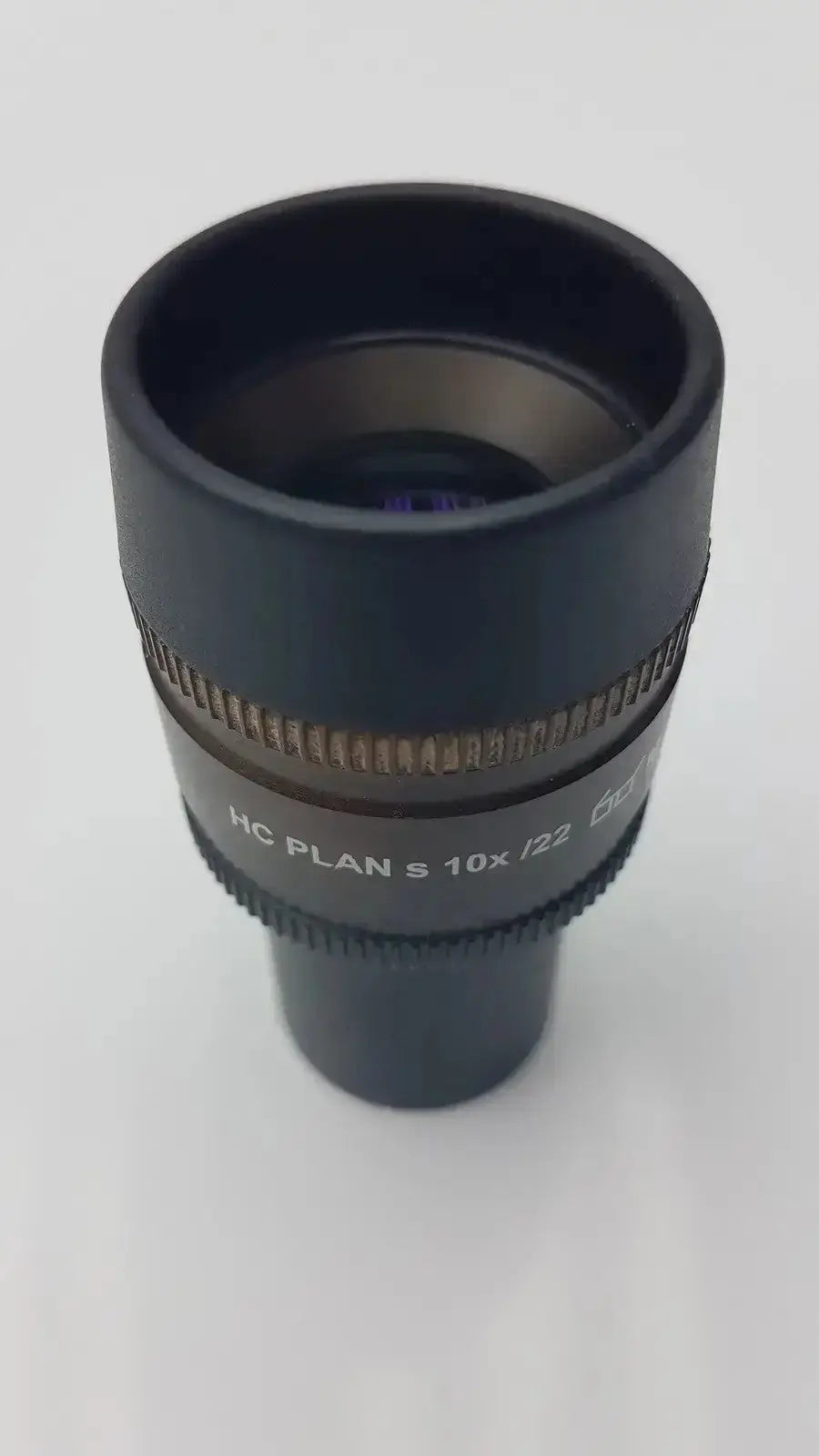 Leica HC Plan S black 10x 22 microscope eyepiece with textured focus ring and engraved specifications from hospital surplus