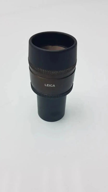 Black Leica HC Plan S 10x 22 M microscope eyepiece with textured rings and matte finish for hospital surplus use
