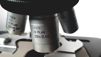 Silver leica hi plan 20x 0.40 microscope objective lens with green ring for leica dm1000 pre owned medical equipment