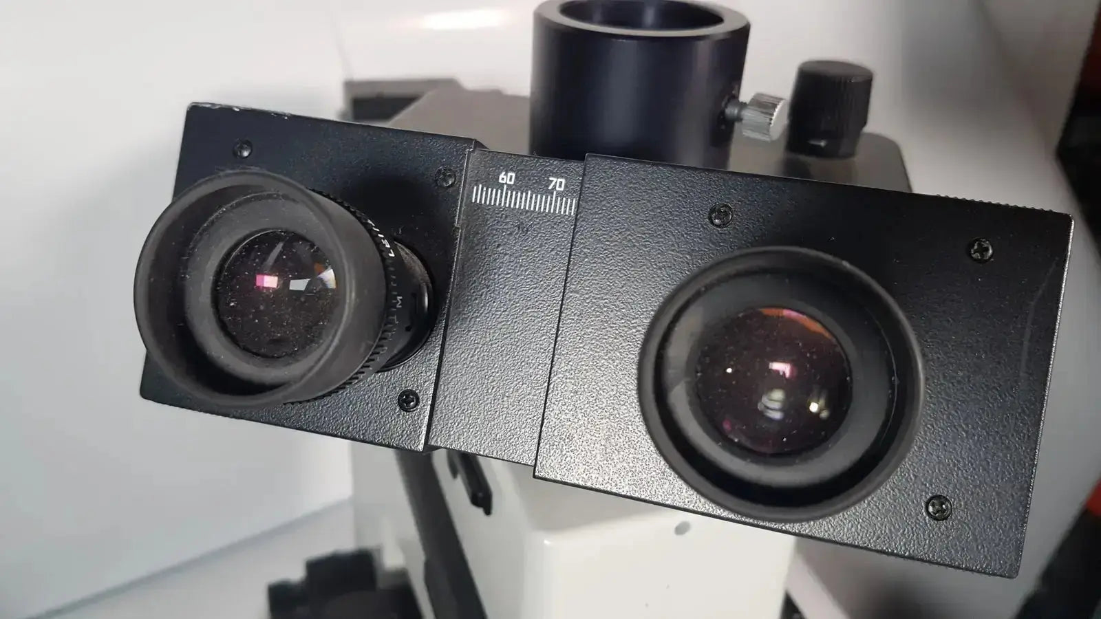 Black dual eyepiece head with matte finish and numbered scale markings for leitz metallux 3 stereo zoom microscope