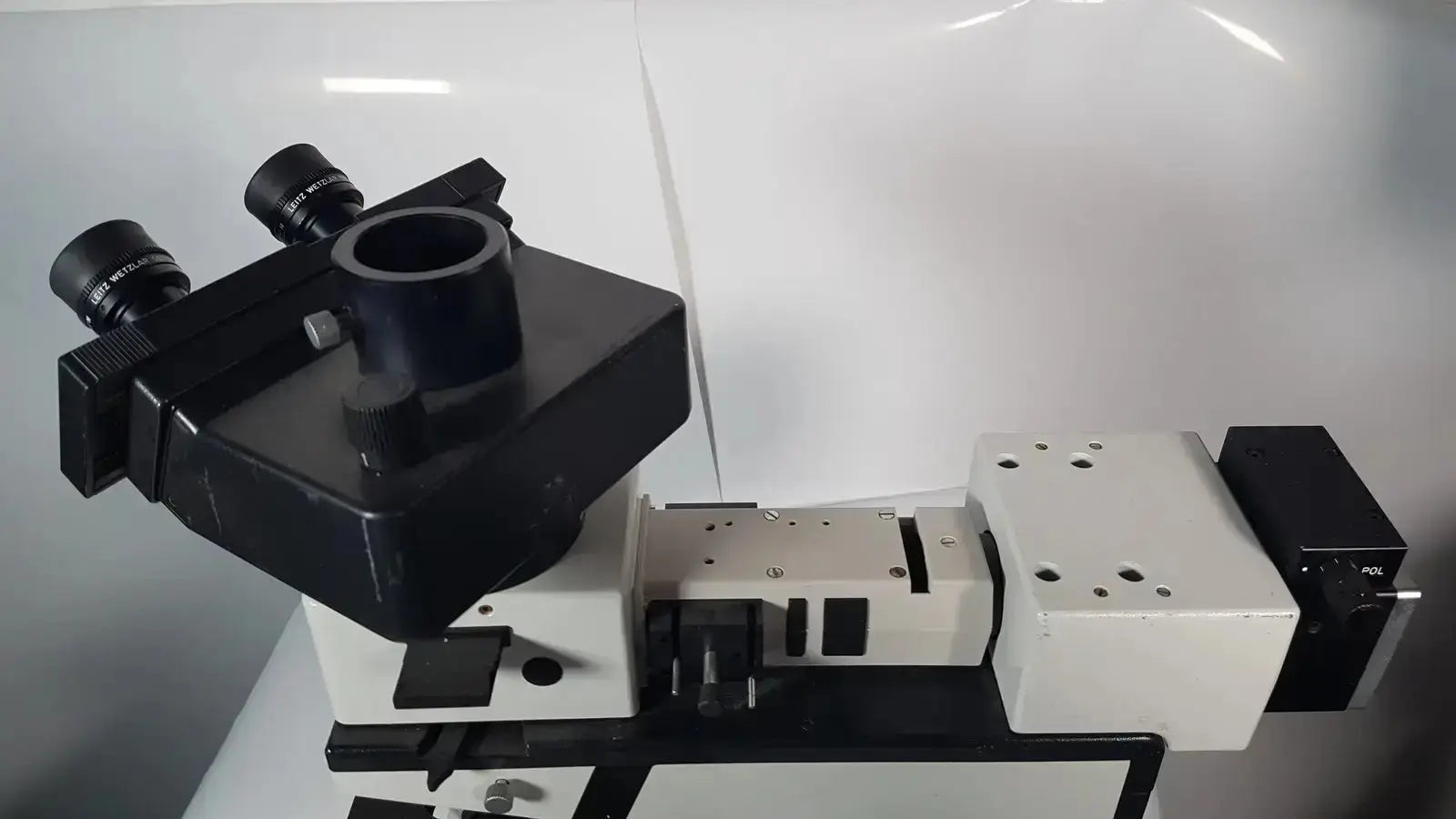 Leitz Metallux 3 stereo zoom microscope in black and white with dual eyepieces and adjustable stage for precise viewing