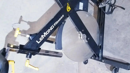 Lemond fitness revmaster sport cycling bike in black with silver flywheel and yellow handlebar adjustments model 15700-3