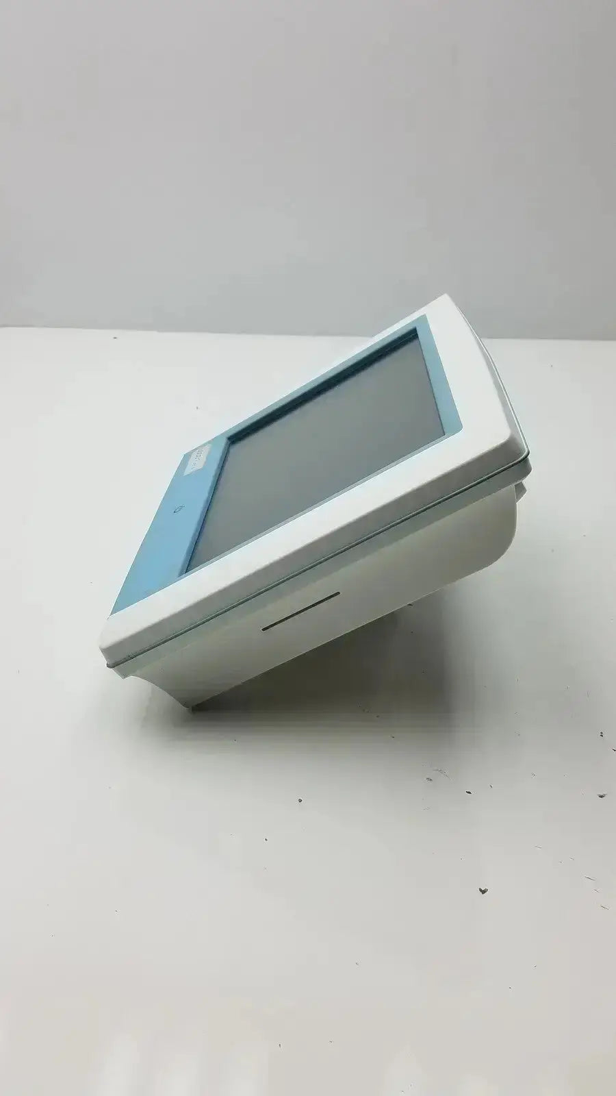 White and light blue touchscreen hemodynamic monitor with sleek rectangular design lidco rapid hm81-01 for clinical use