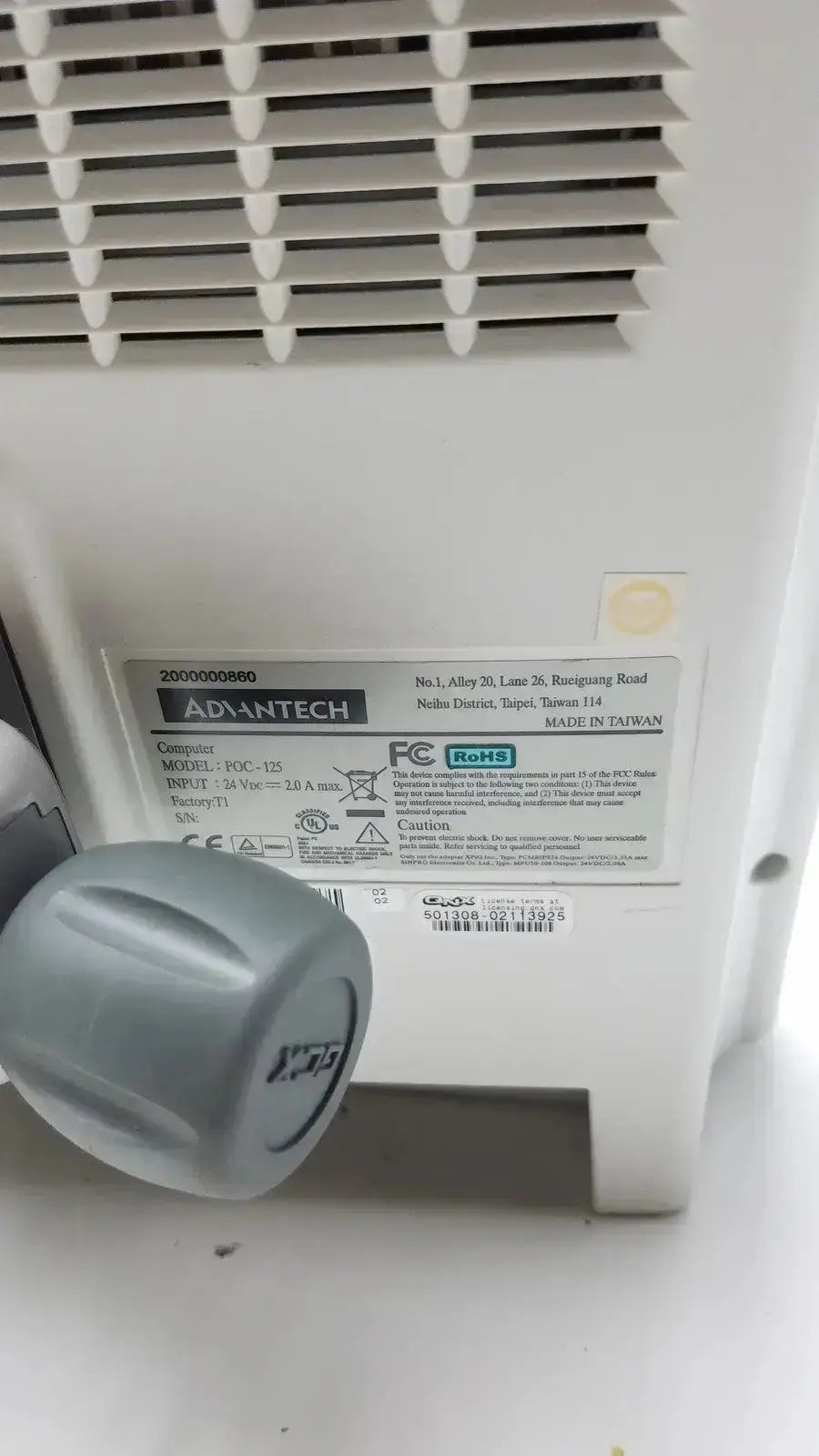 Gray plastic power supply unit with ventilation grille and label for lidco rapid hm81-01 hemodynamic monitor back side
