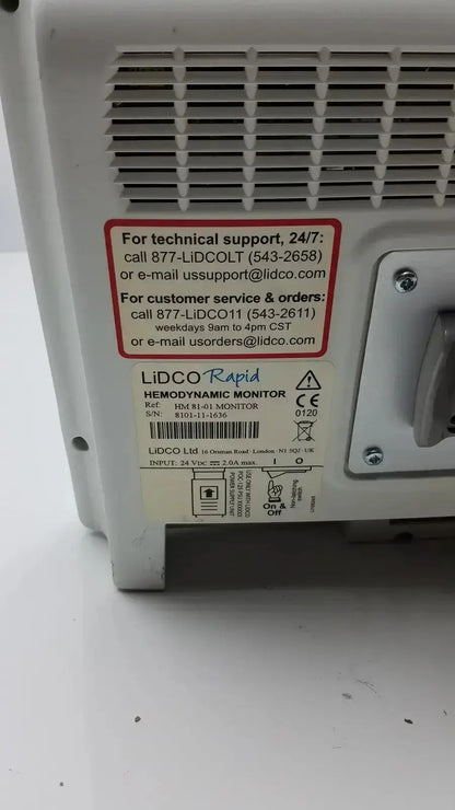 White plastic lidco rapid hm81-01 hemodynamic monitor back panel with vented design and labeled technical specifications