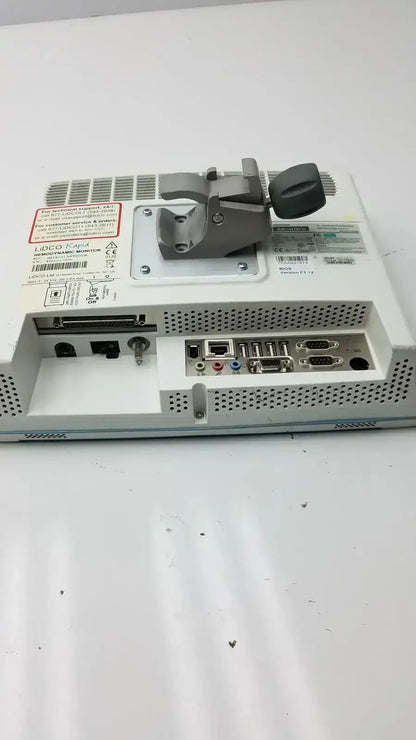 Back view of white lidco rapid hm81-01 hemodynamic monitor with gray mounting bracket and multiple ports