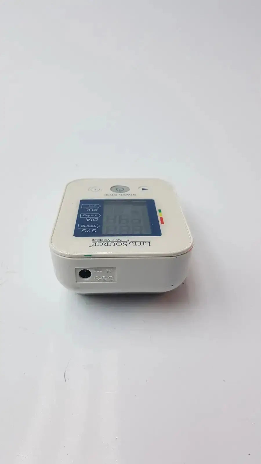 Life Source A&D medical digital blood pressure monitor UA-652L-AC white plastic with blue display and labeled indicators