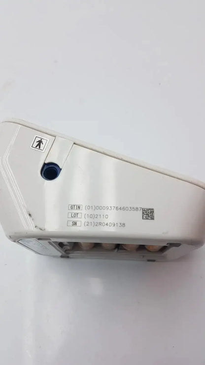 White plastic receipt printer with blue circular port and labels for life source a&d medical digital blood pressure monitor ua-652l-ac