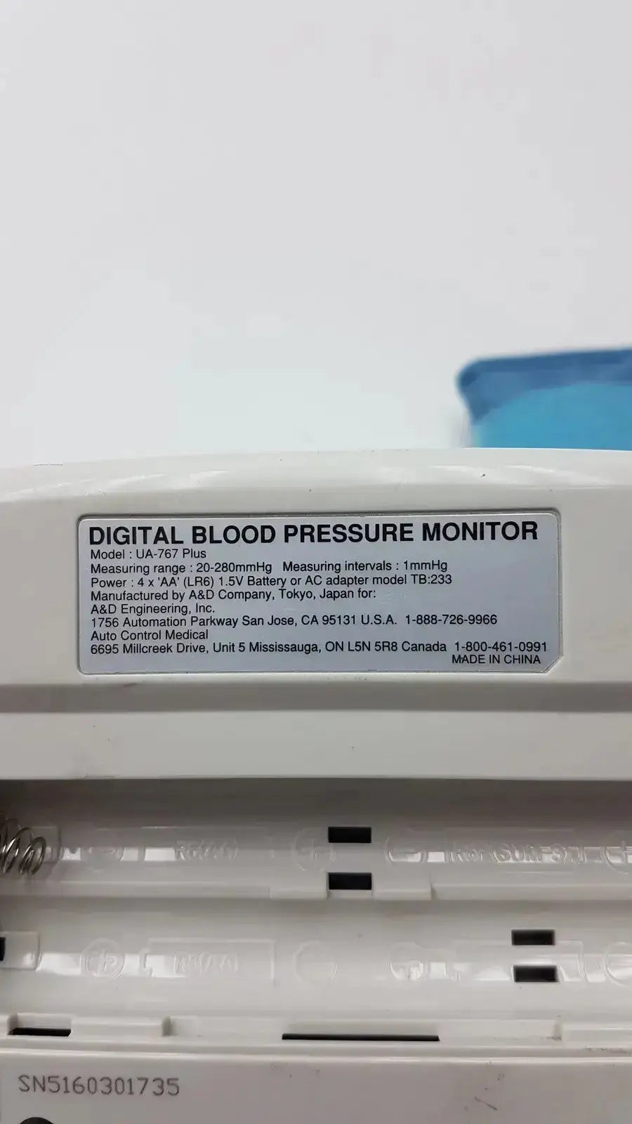 White plastic life source ua-767 plus digital blood pressure monitor with model label and specifications displayed