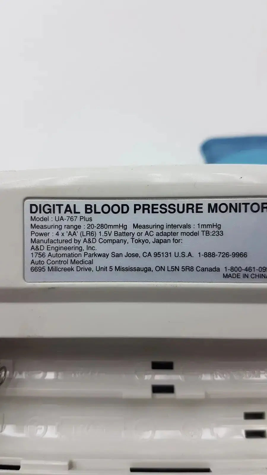 White plastic life source ua-767 plus digital blood pressure monitor with model label and manufacturer details visible