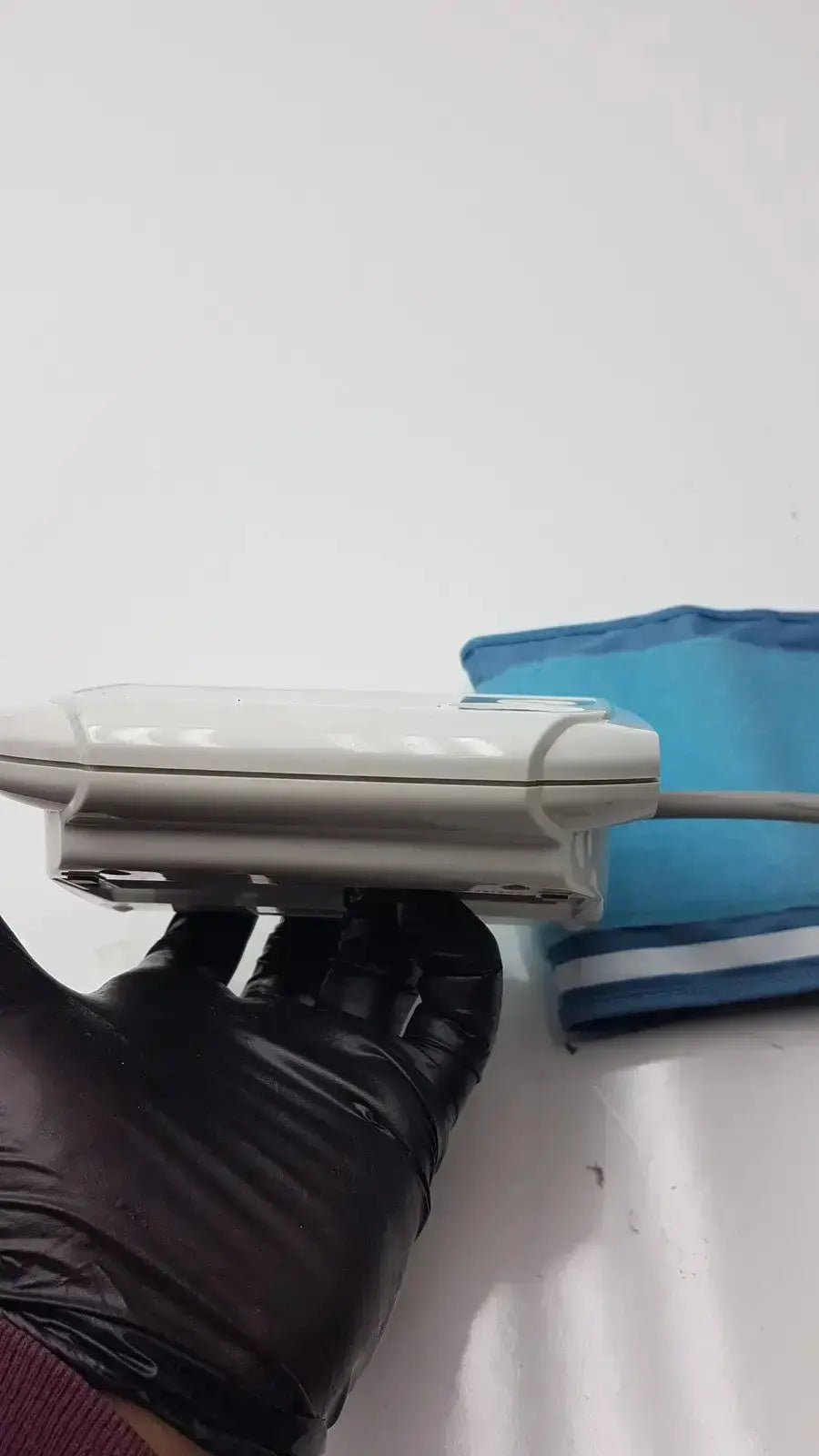 White plastic life source ua-767 plus digital blood pressure monitor with blue inflatable cuff for home use