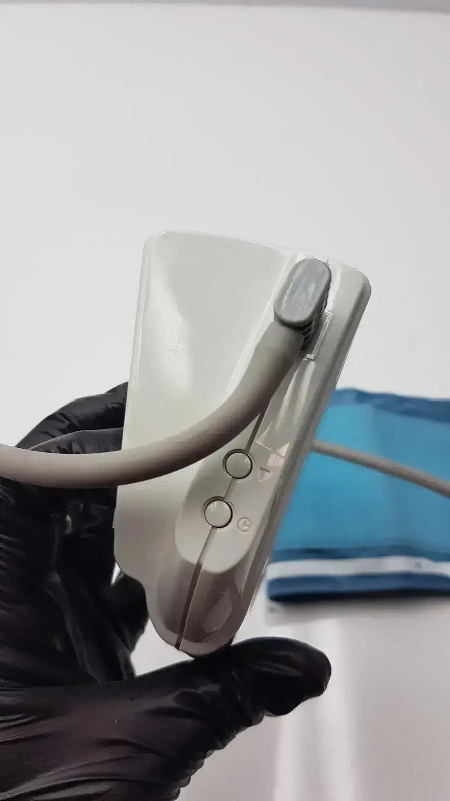 Life Source ua-767 plus digital blood pressure monitor in off-white with curved gray cuff and two circular control buttons