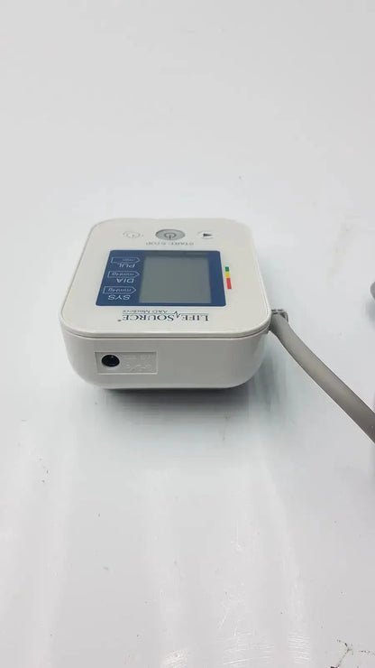 White plastic lifeSource a&d medical ua-651s-ac digital blood pressure monitor with blue display panel and gray tubing