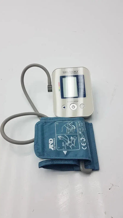 LifeSource A&D Medical digital blood pressure monitor UA-651S-AC with silver body, blue fabric cuff, and gray tubing