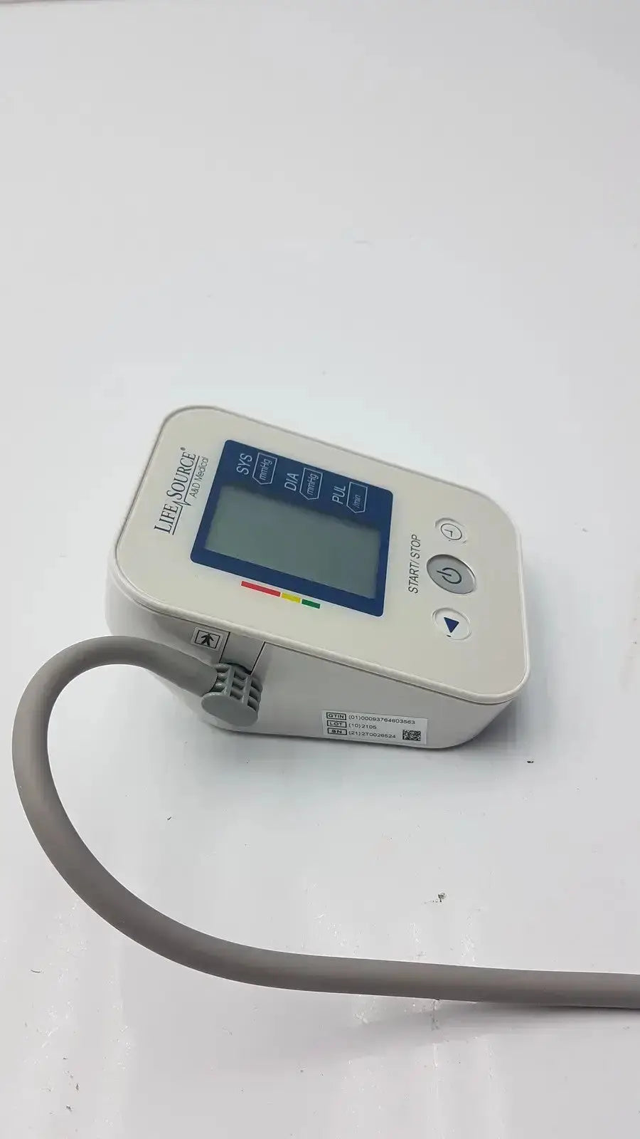 LifeSource A&D Medical digital blood pressure monitor UA-651S-AC with a white body, gray cuff, and blue display screen