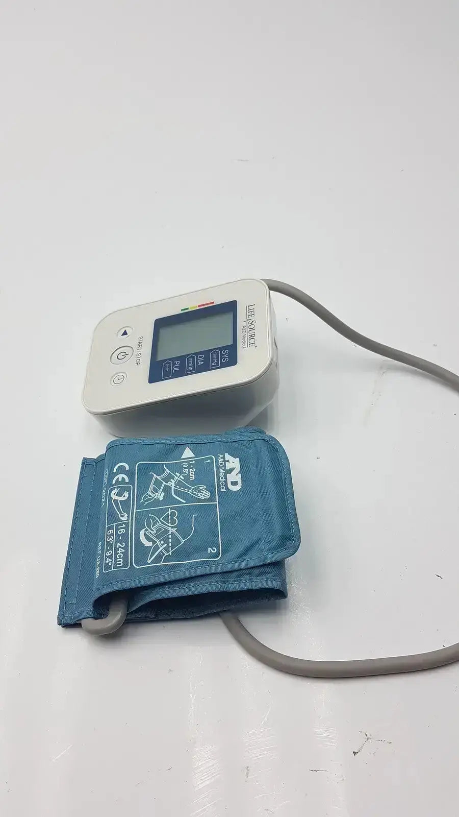 LifeSource A&D Medical digital blood pressure monitor UA-651S-AC with white body blue cuff and gray tubing