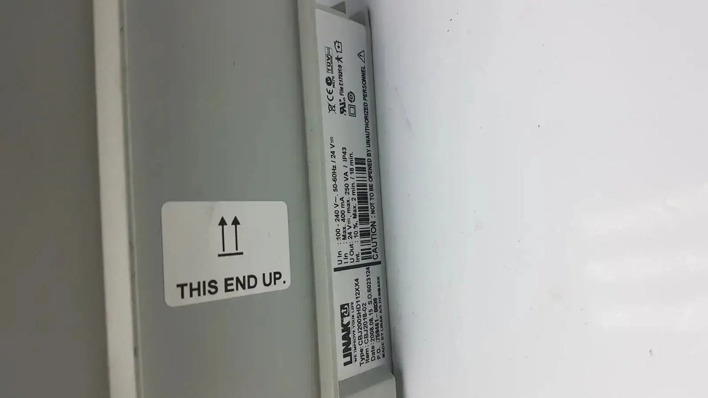 Gray rectangular control box power supply unit with white label and barcode for linak cbj linak cbj2005hd112xx4 back side