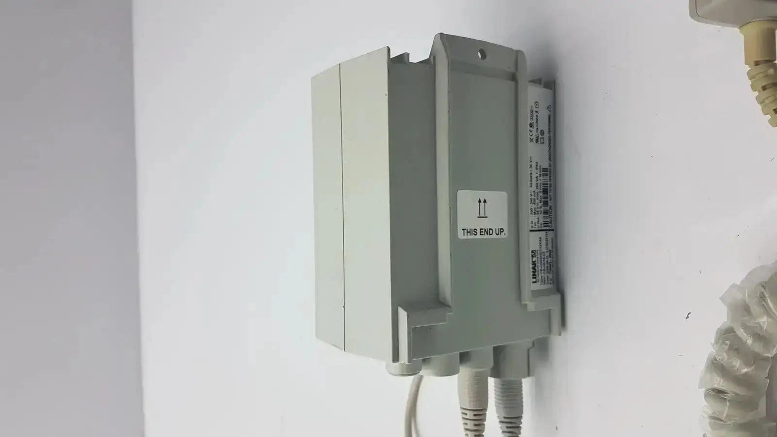 Gray plastic industrial control box with this end up label and cables for cbj linak cbj2005hd112xx4 model cbj2018-02