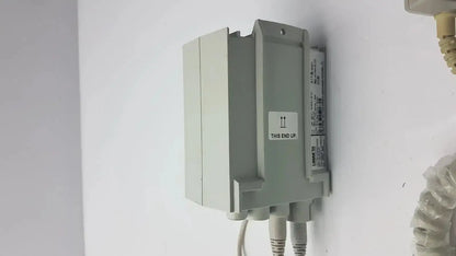 Gray plastic industrial control box with this end up label and cables for cbj linak cbj2005hd112xx4 model cbj2018-02