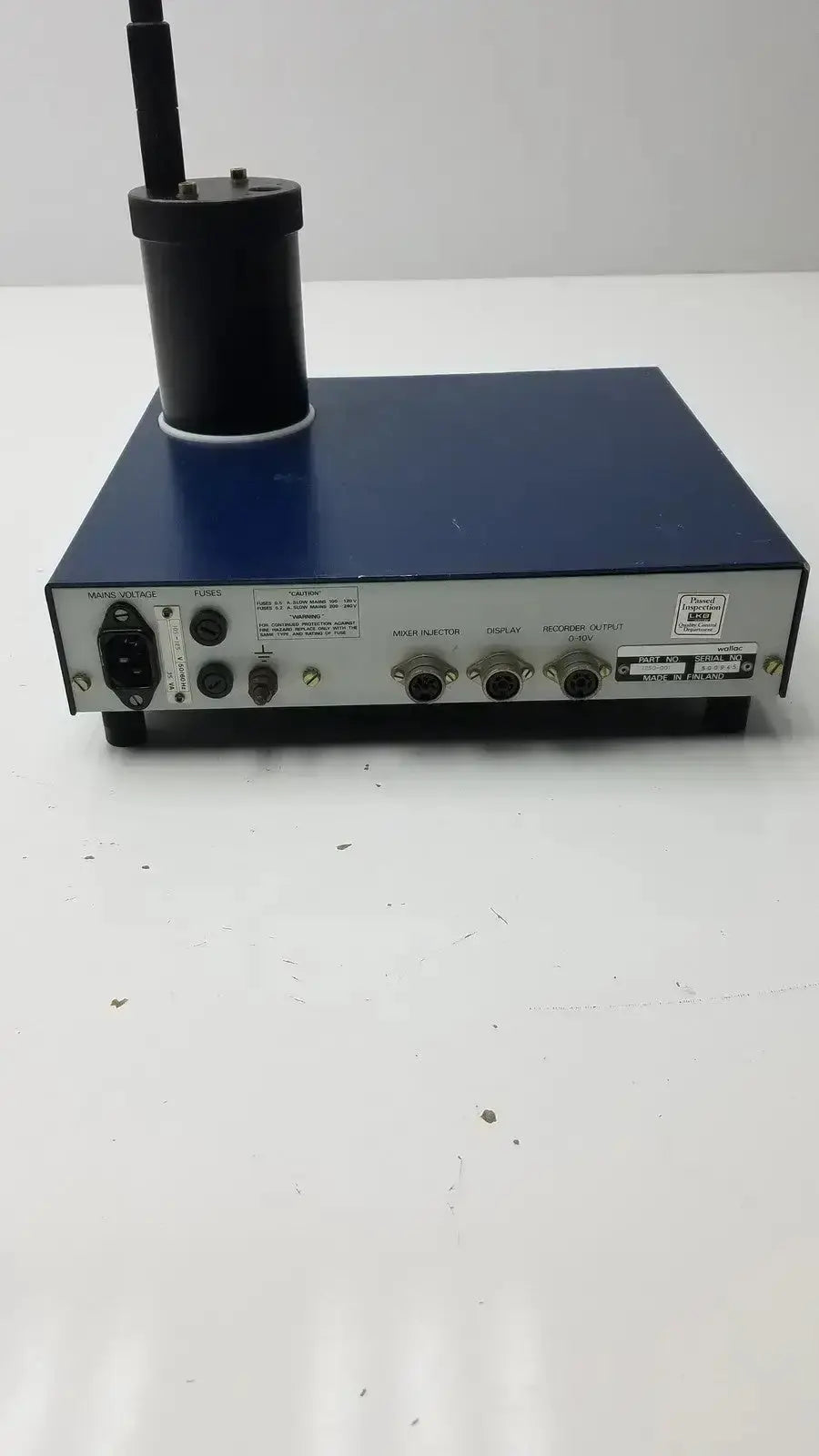 Blue rectangular lkb wallac 1250 luminometer with black antenna and multiple ports for hospital surplus biomedical use