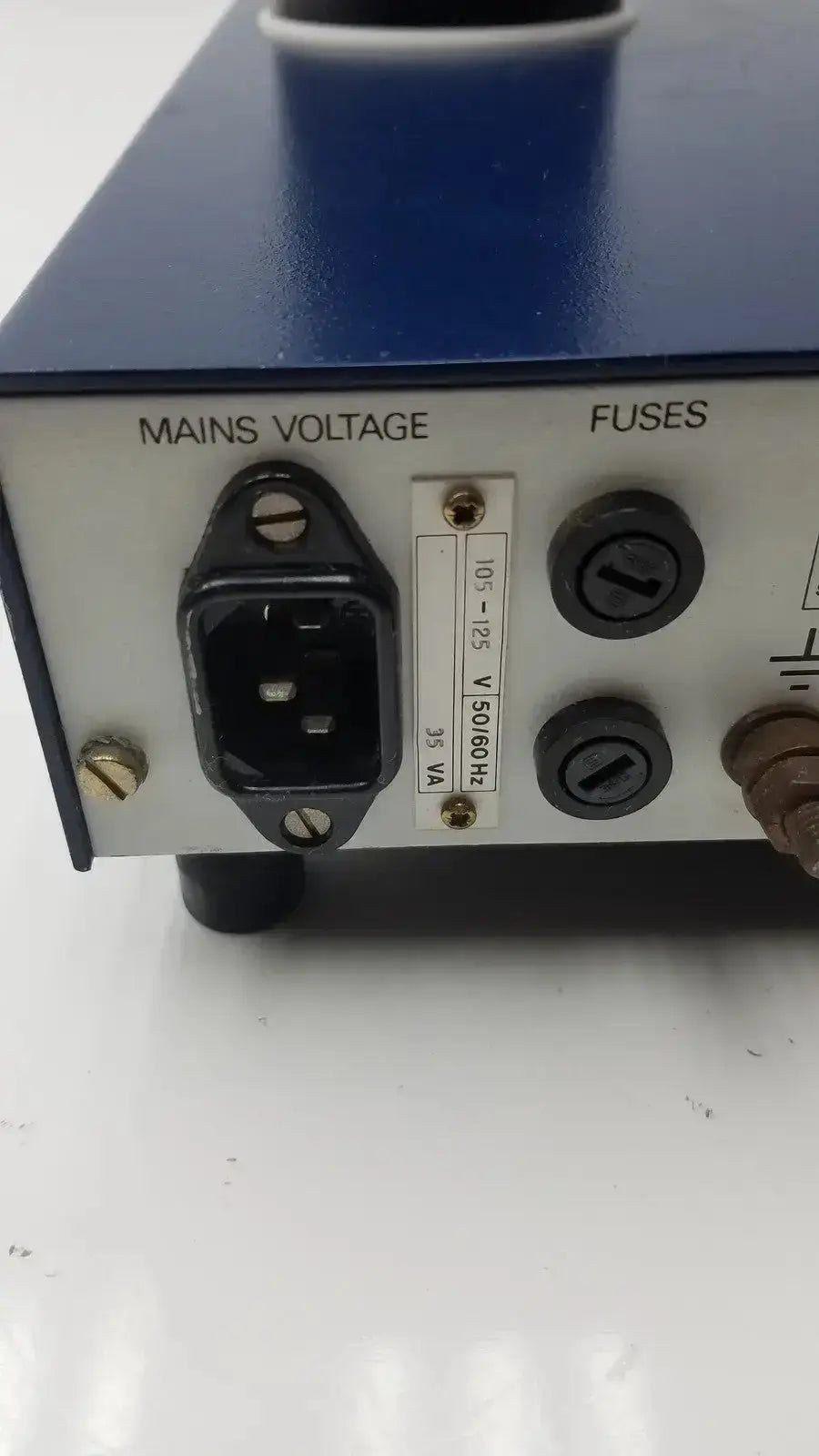 Rear view of blue and silver lkb wallac 1250 luminometer power supply unit with ac input and fuse holders for biomedical technicians