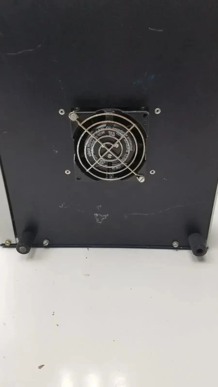 Black rectangular lkb wallac 1250 luminometer with circular silver fan grille on back panel for hospital surplus use