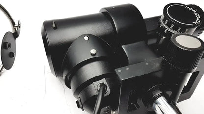 Black metal telescope mount with adjustable horizon and altitude knobs on lombart instrument keratometer model 12515