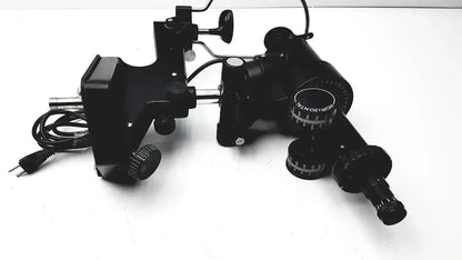Black metal lombart instrument keratometer model 12515 with adjustable knobs and power cord for precise eye measurement