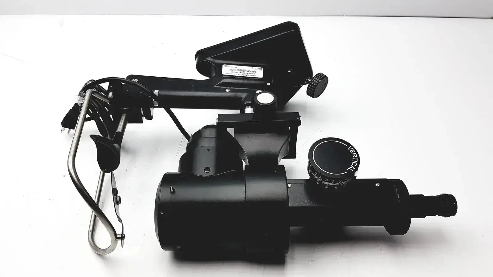 Black metal telescope mount with adjustable arm and tripod base in lombart instrument keratometer model 12515