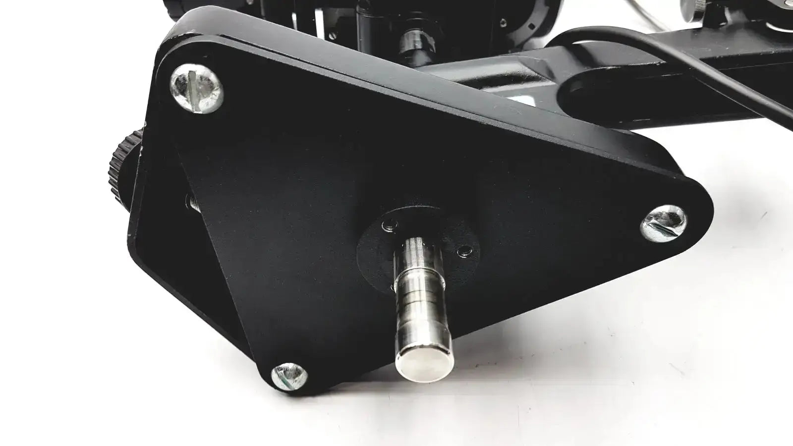 Black triangular metal mount with central silver shaft and four screws for lombart instrument keratometer model 12515